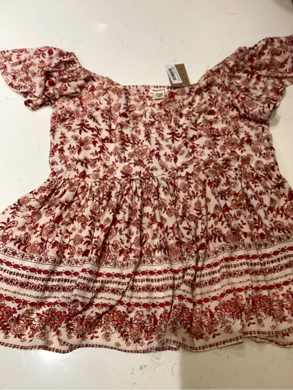 Red Floral Off-Shoulder Peplum Blouse - Cream Background